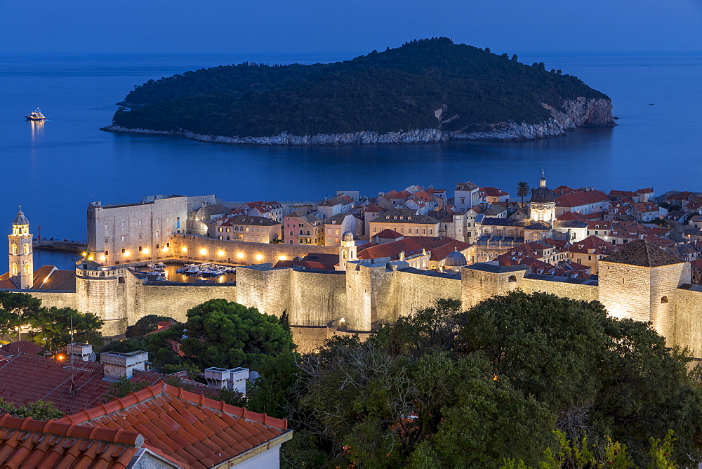 Elevated view from a lookout over the old town of Dubrovnik and Lokrum Island at dusk, Dubrovnik, Croatia, Europe