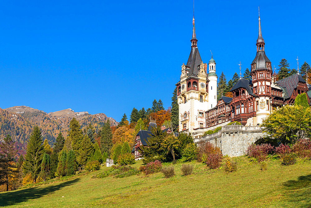 Peles Castle in the Bucegi Mountains Natural Park during autumn, Sinaia, Romania, Europe