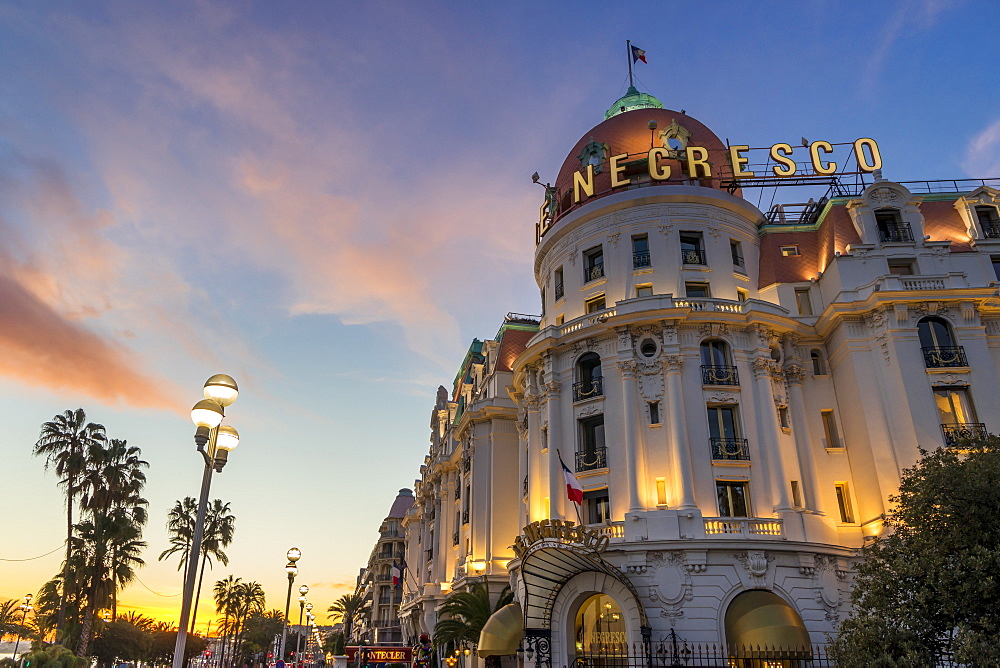 Illuminated Le Negresco Hotel building at sundown, Nice, Alpes Maritimes, Cote d'Azur, French Riviera, Provence, France, Mediterranean, Europe