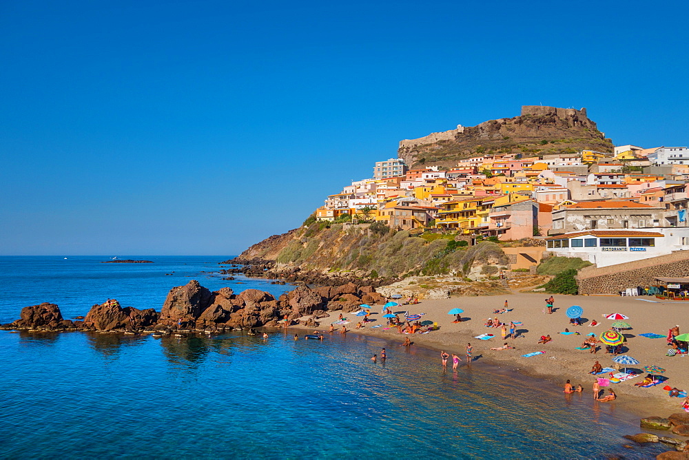 Tourists on beach of Castelsardo, Sardinia, Italy, Europe