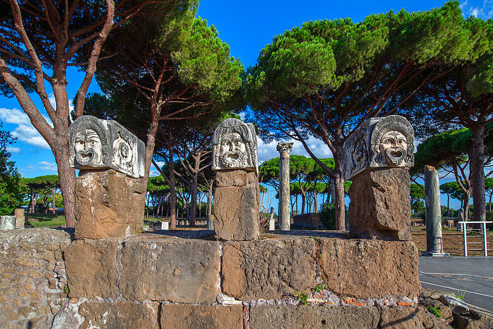 Surroundings of the theatre, three theatrical masks, Ostia Antica, Rome, Lazio, Italy, Europe