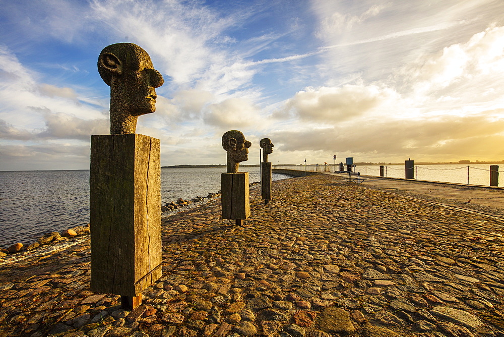 The sculpture group The Three Wise Men', by Johannes Phillip, at the entrance to the harbor in the fishing village of Wieck, Greifswald, Mecklenburg-Vorpommern, Germany, Europe