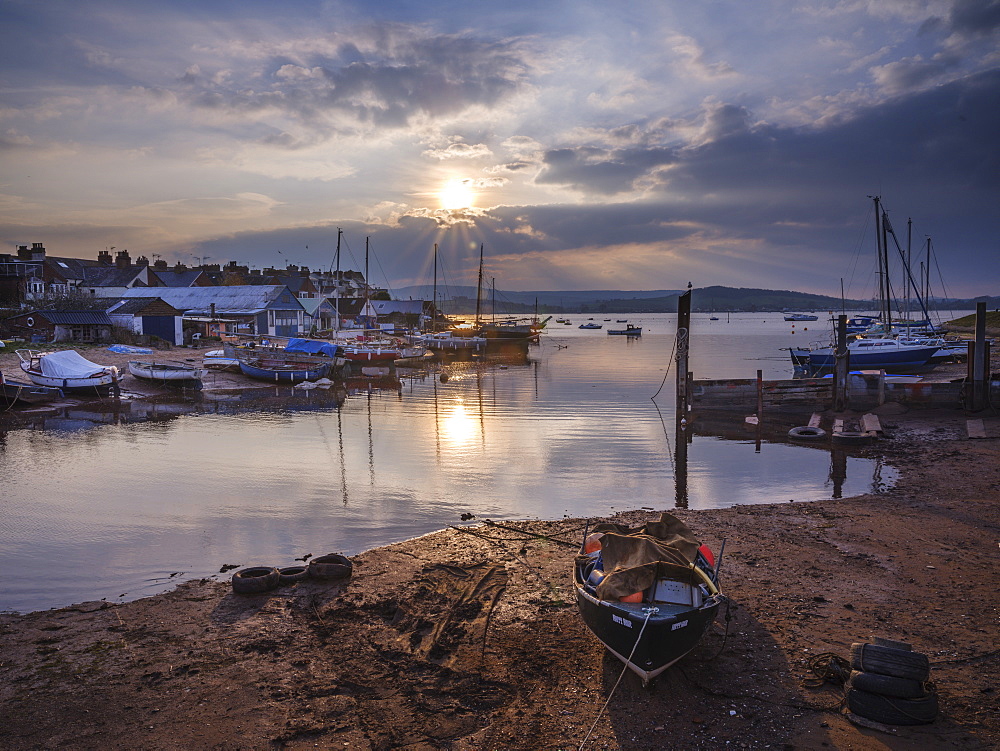 Sunset with boats on the Exe shoreline at the back of Camperdown Terrace, Exmouth, Devon, England, United Kingdom, Europe