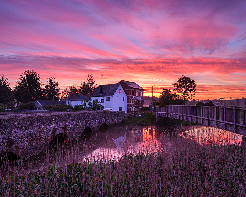 Dawn sky with two bridges over the River Clyst at Topsham, Devon, England, United Kingdom, Europe