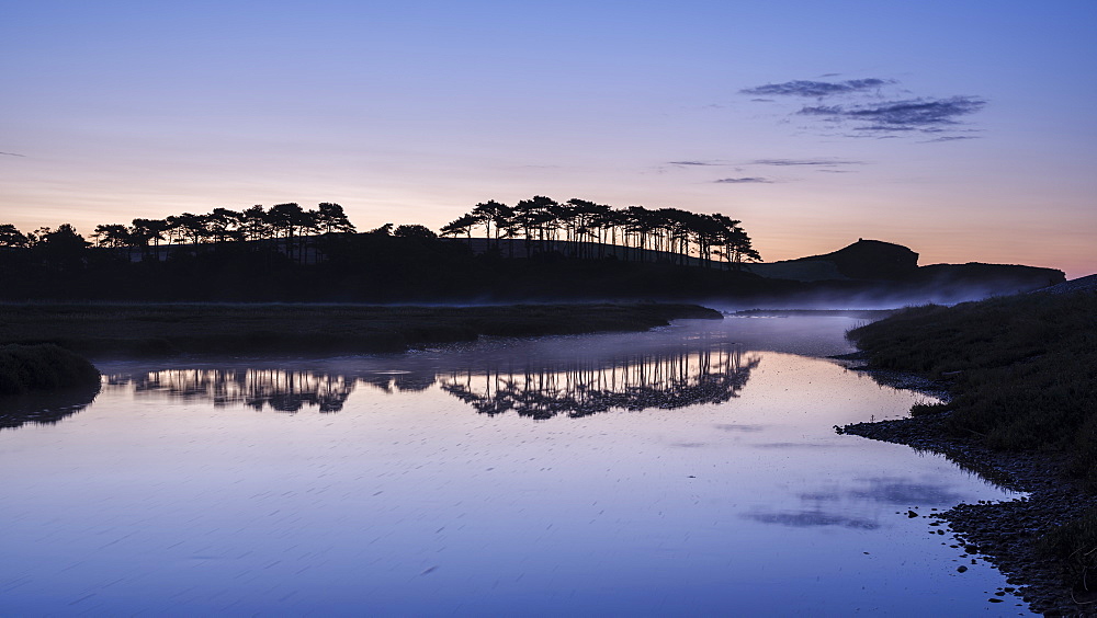 Twilight with a rising mist and perfect reflections on the River Otter at Budleigh Salterton, Devon, England, United Kingdom, Europe