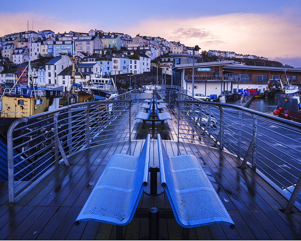 Wet teak decking and benches of the elevated nautical viewpoint for the harbour of Brixham, Devon, England, United Kingdom, Europe