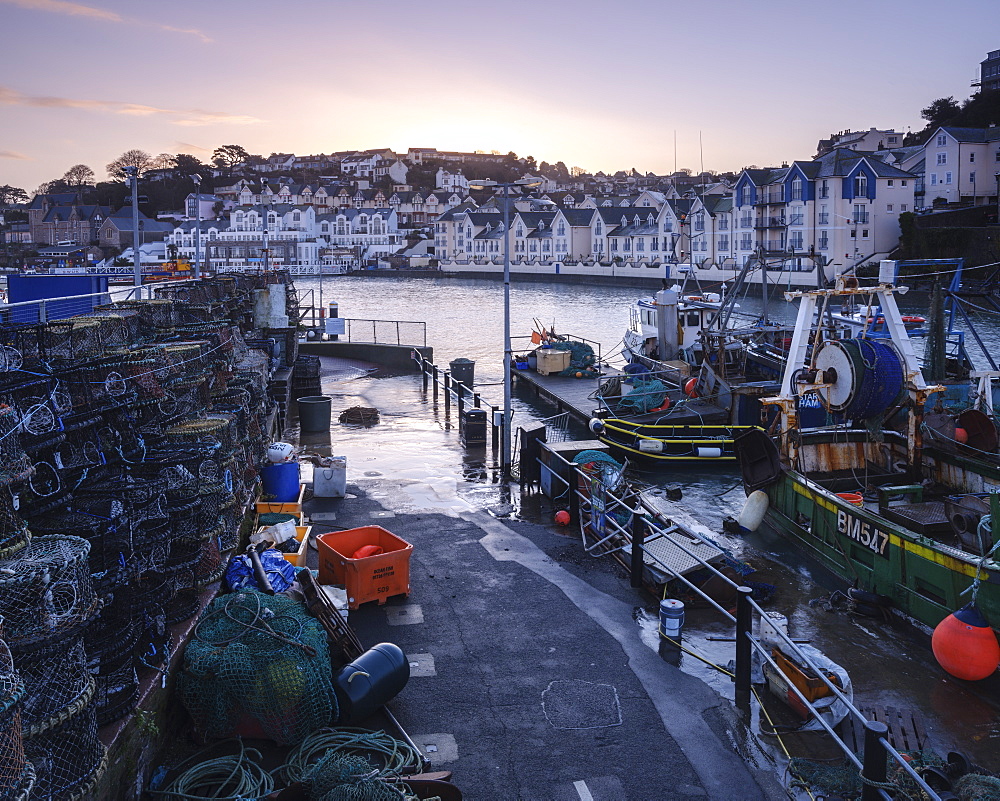 High tide at dawn in the harbour of the fishing port of Brixham, Devon, England, United Kingdom, Europe