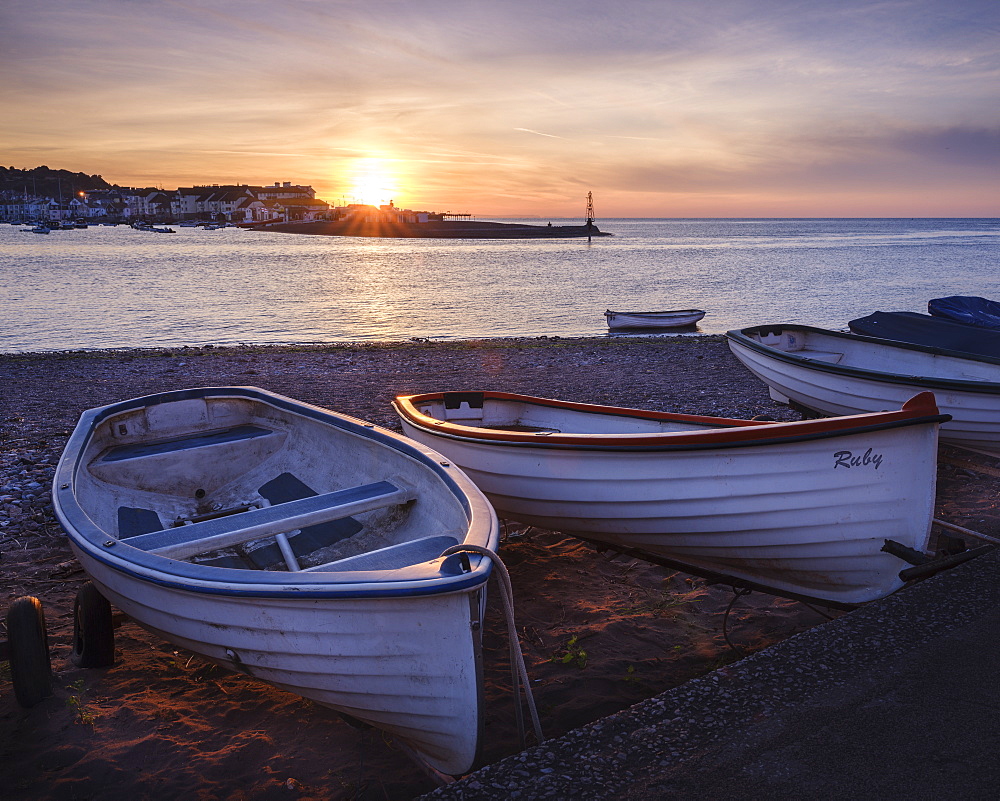 Boats at sunrise looking across entrance to Teign estuary to Teignmouth at Shaldon, Devon, England, United Kingdom, Europe