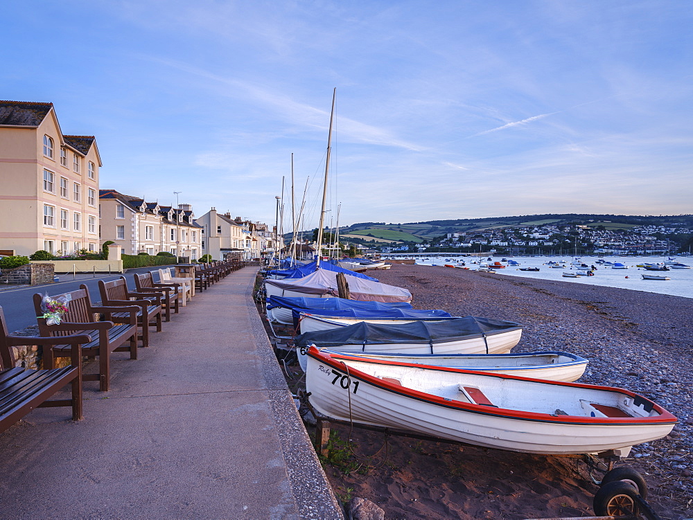 Boats and benches lined up along the top of the beach at Shaldon, Devon, England, United Kingdom, Europe