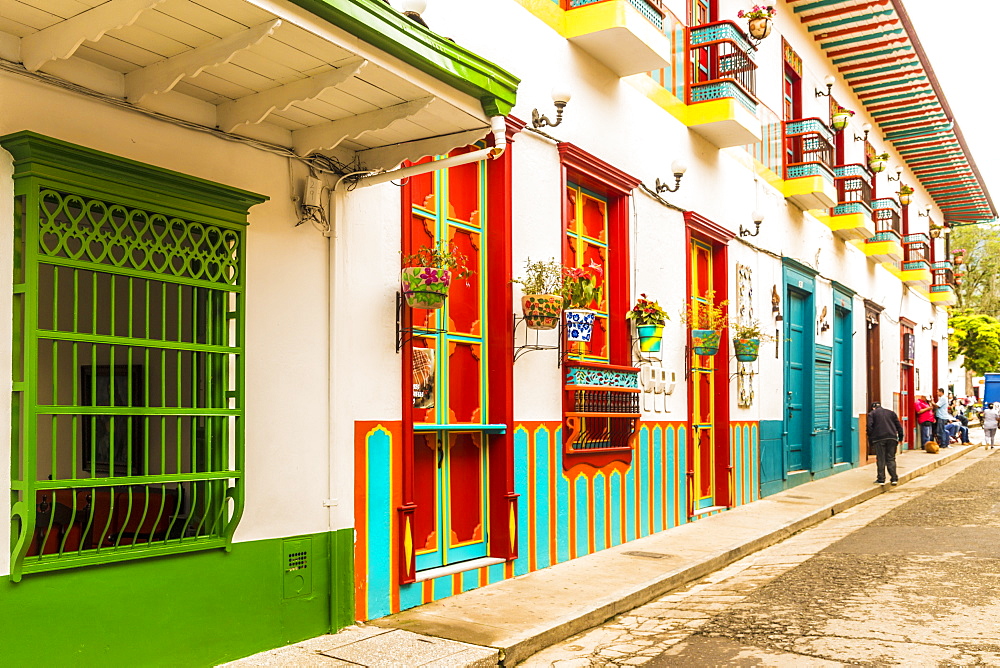 A colourful street scene with its preserved and colonial buildings, Jardin, Colombia, South America