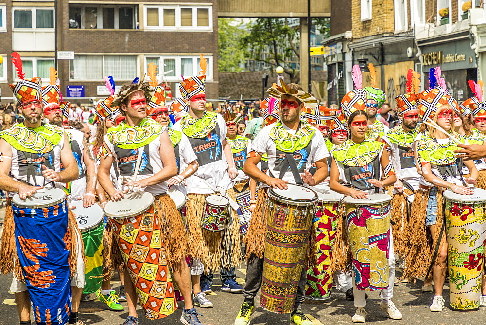 Some of the colourfully dressed drummers at the Notting Hill Carnival, London, England, United Kingdom, Europe