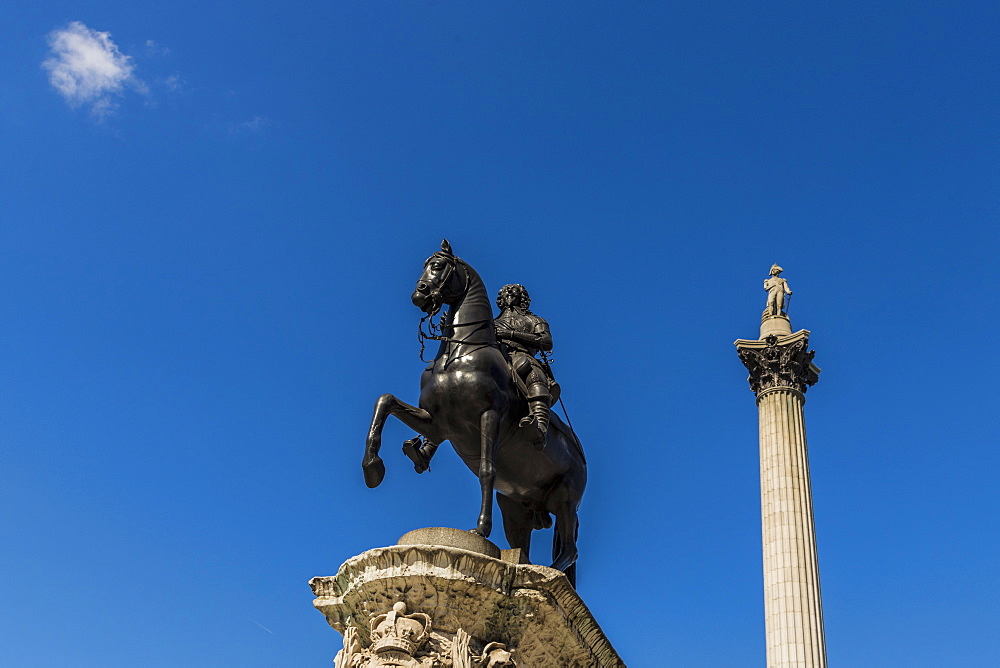 The Charles I statue and Nelsons Column in Trafalgar Square ,London, England, United Kingdom, Europe