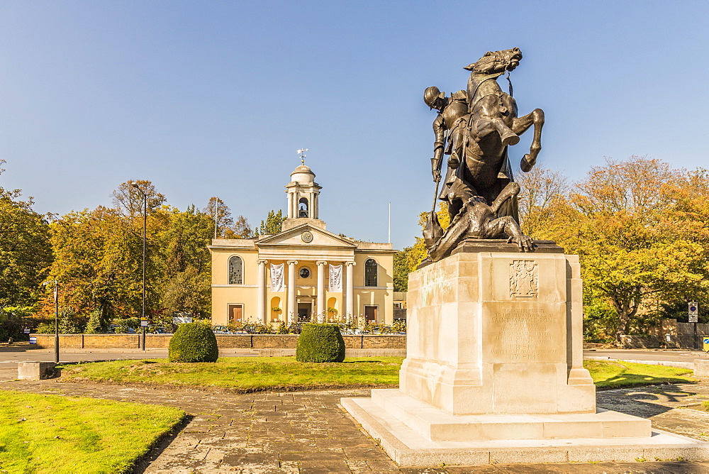 St. George and the Dragon statue and St. Johns Wood church in the background, London, England, United Kingdom, Europe