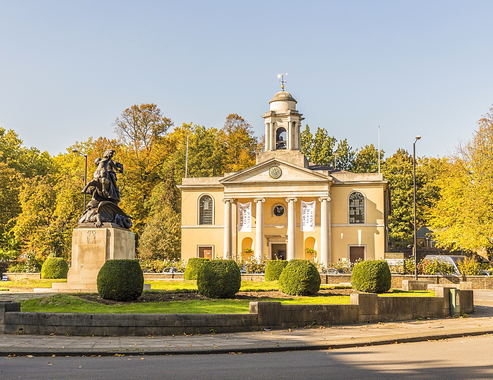 St. George and the Dragon statue and St. Johns Wood church in the background, London, England, United Kingdom, Europe