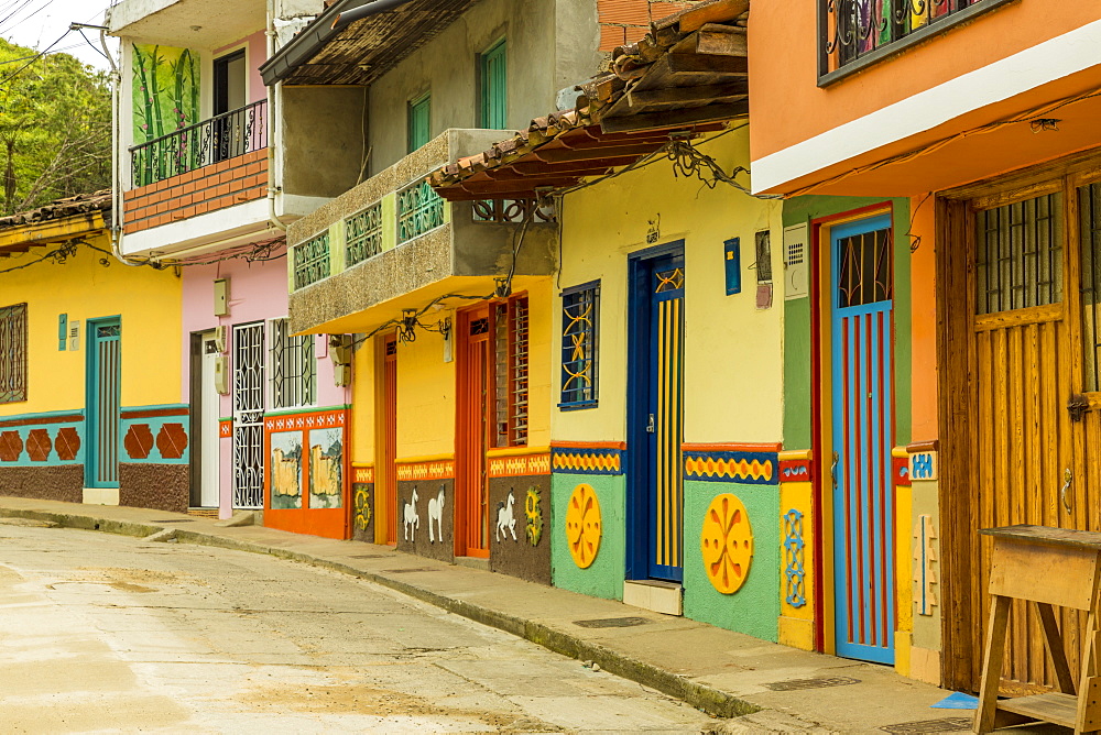 A typically colourful street with traditional buildings in the picturesque town of Guatape, Colombia, South America