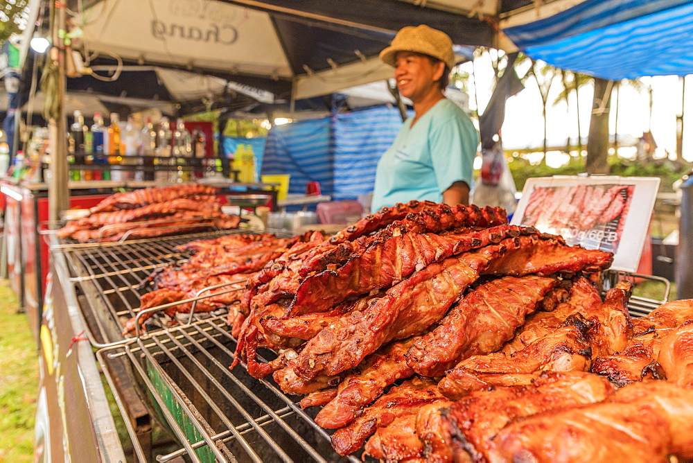 A food stall selling grilled meat in the night market in Kamala in Phuket, Thailand, Southeast Asia, Asia