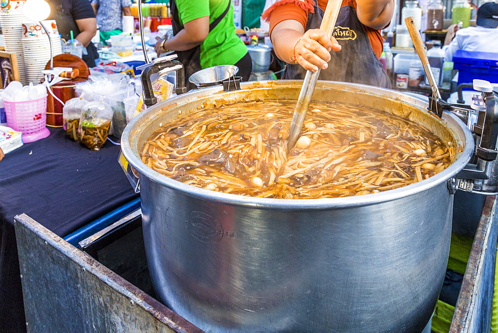 A noodle stall at the famous Walking Street night market in Phuket old Town, Phuket, Thailand, Southeast Asia, Asia