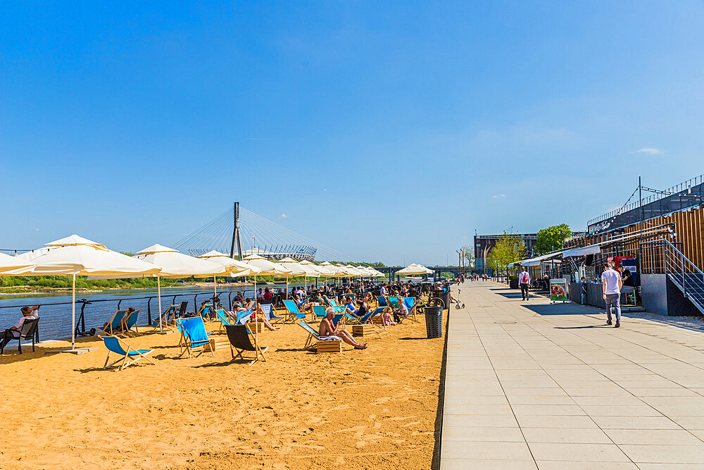 The beach and outdoor restaurants along the Vistulan Boulevards beside the Vistula River, Warsaw, Poland, Europe