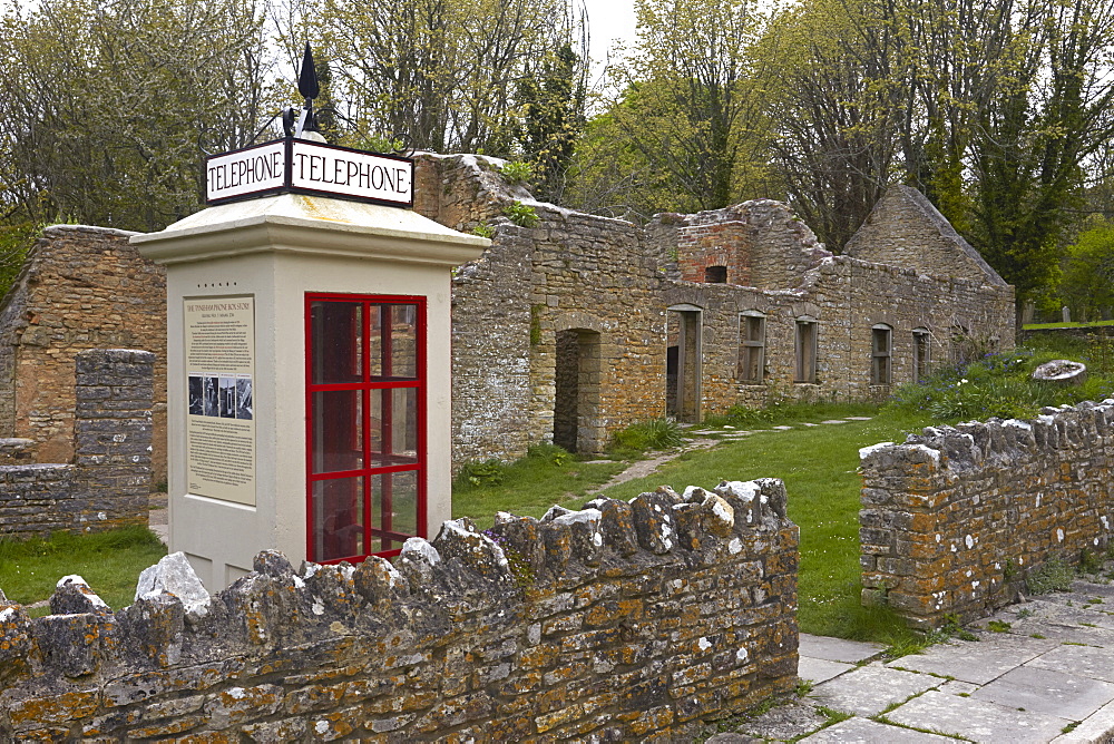 The abandoned ghost village of Tyneham showing the restored 1940s telephone booth, near Wareham, Dorset, England, United Kingdom, Europe