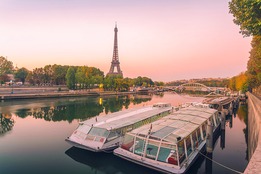 View of Eiffel Tower on the River Seine early in the morning in autumn, Paris, France, Europe