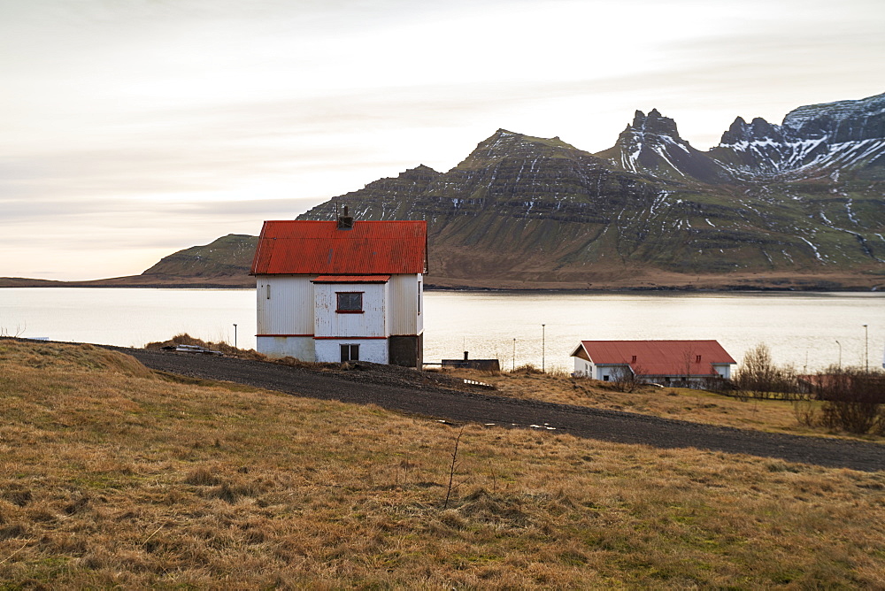 Traditional Icelandic house in Stodvarfjordur by the Fjords in East Iceland, Iceland, Polar Regions