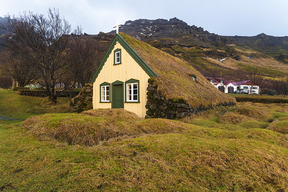 Lutheran Myrdal Turf Church of Hof surrounded by moss, Skaftafell, Iceland, Polar Regions