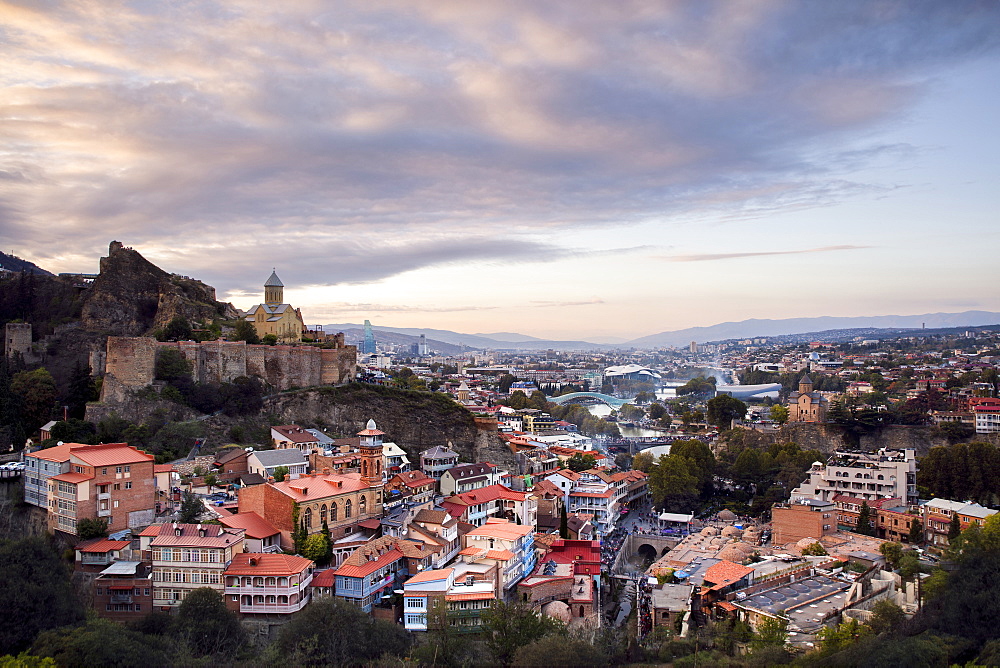 Sunset over the city of Tbilisi from a secret lookout point, Georgia, Central Asia, Asia