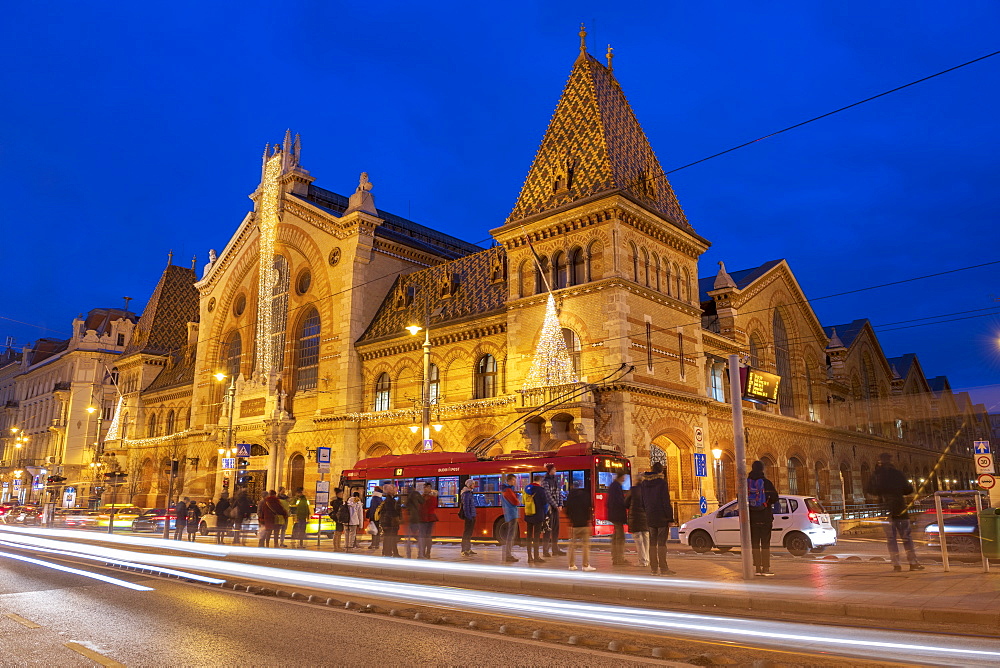 Exterior of Great Market Hall (Central Market Hall) at night with light trails, Kozponti Vasarcsarnok, Budapest, Hungary, Europe