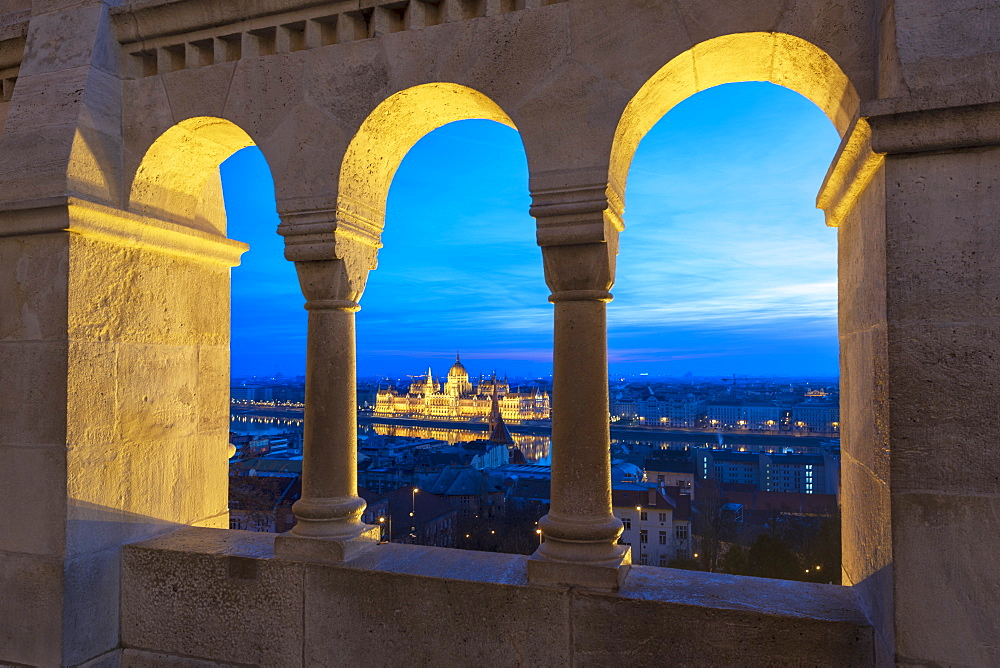 Hungarian Parliament viewed from the columns of the Fisherman's Bastion, UNESCO World Heritage Site, Budapest, Hungary, Europe