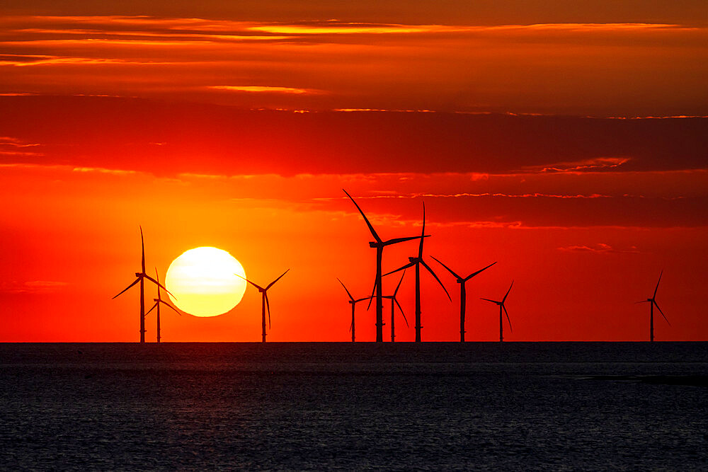 Offshore windfarm with amazing sunset, New Brighton, Cheshire, England, United Kingdom, Europe