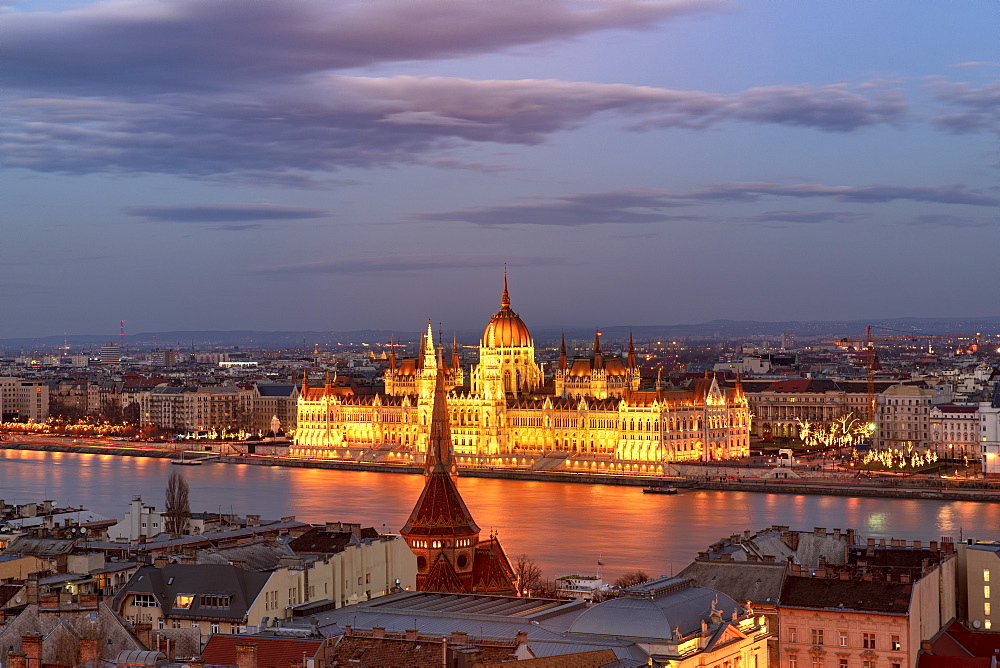 The Hungarian Parliament and the River Danube at night, UNESCO World Heritage Site, Budapest, Hungary, Europe