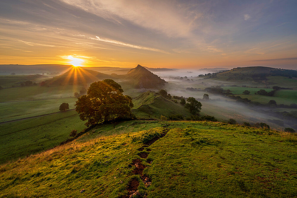 Sunrise at Chrome Hill and Parkhouse hill with low lying cloud in The Peak District, Derbyshire, England, United Kingdom, Europe