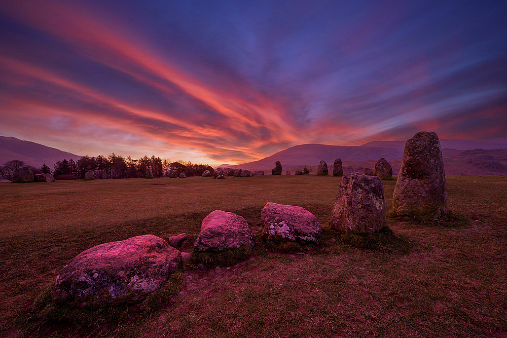 Dramatic sunrise at Castlerigg Stone Circle, Lake District, Cumbria
