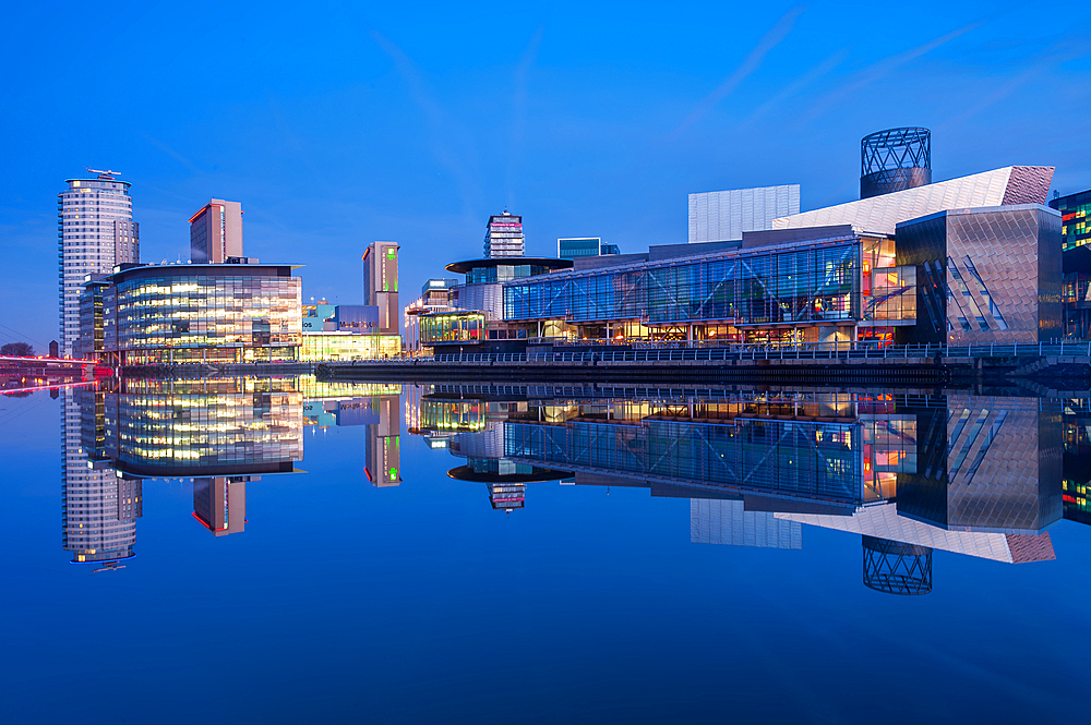 Salford Quays and The Lowry Theatre reflected with mirror conditions, Salford, Manchester