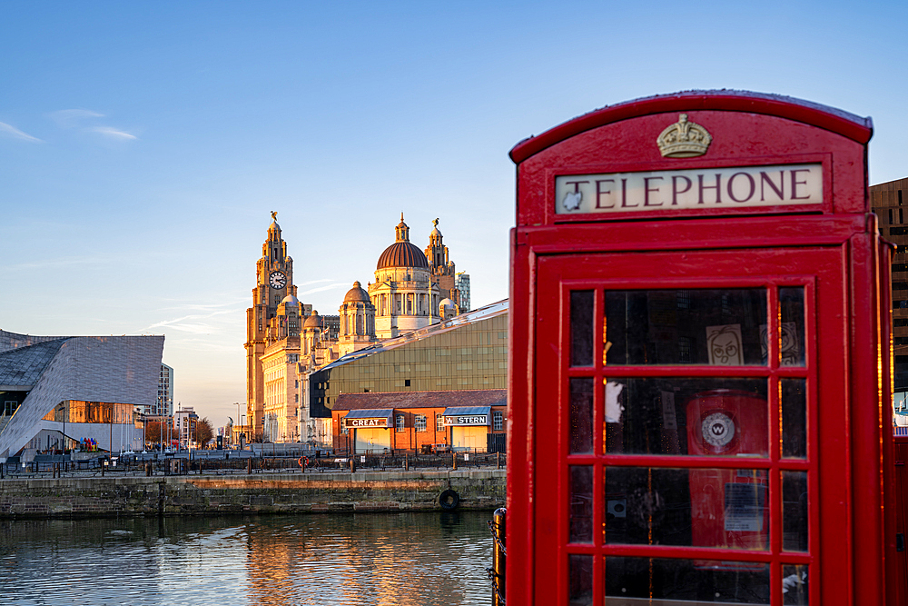 The Liver Buildings and the Albert Dock with red telephone box, Liverpool Merseyside