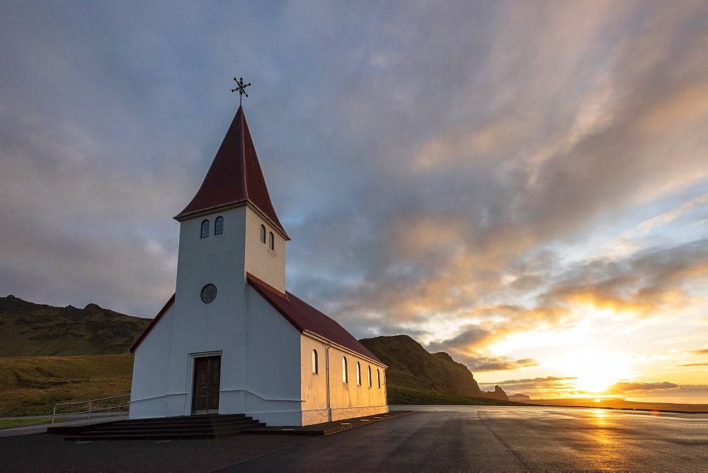 Vik church at sunrise, near Vik, South Iceland, Iceland, Polar Regions