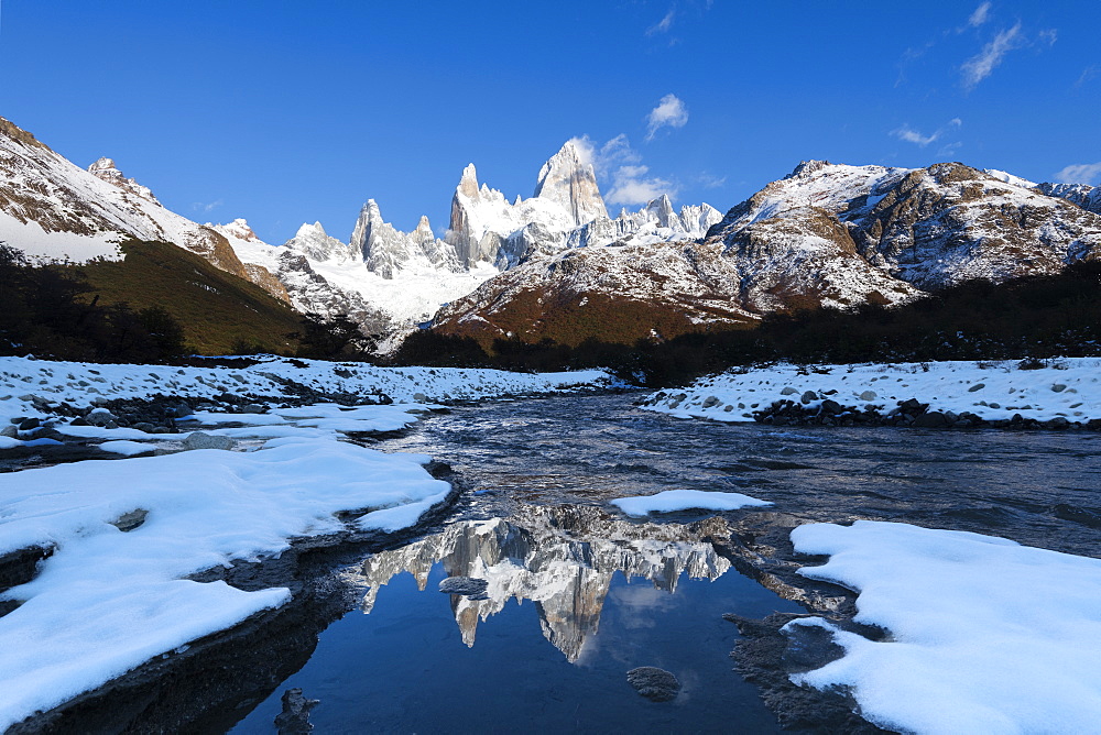 Mount Fitz Roy and Cerro Torre in winter conditions at sunrise reflected, Los Glaciares National Park, UNESCO World Heritage Site, El Chalten, Santa Cruz Province, Patagonia, Argentina, South America