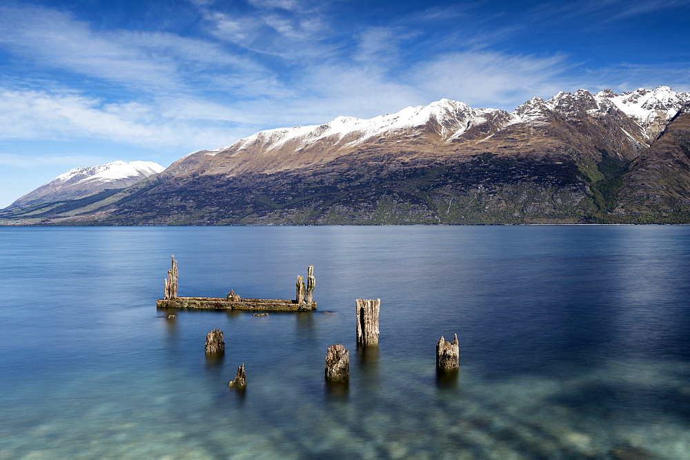 Decayed jetty, old wooden posts in Lake Wakatipu at Glenorchy, Otago Region, South Island, New Zealand, Pacific