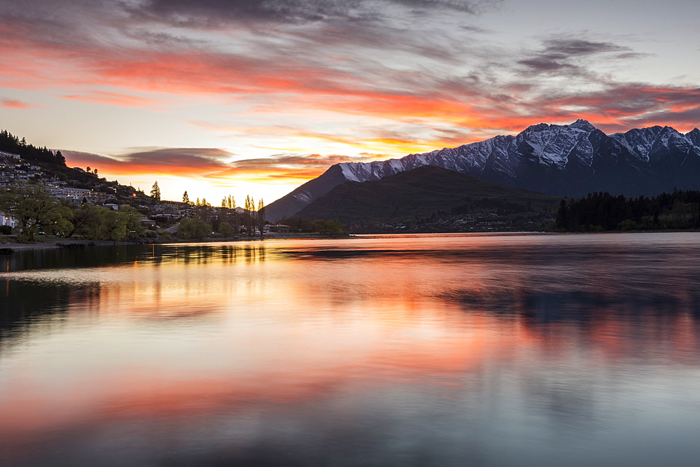 Queenstown and Bob's Peak with red sky at sunrise, Otago, South Island, New Zealand, Pacific