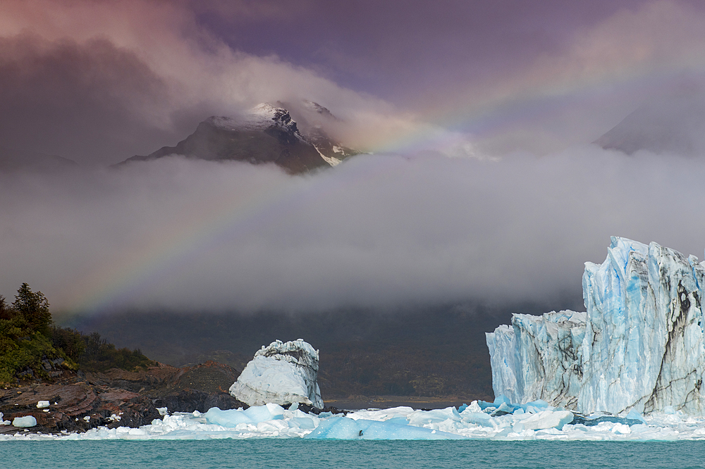 Rainbow and dramatic cloud over Perito Moreno Glacier in Los Glaciares National Park, UNESCO World Heritage Site, Patagonia, Argentina, South America