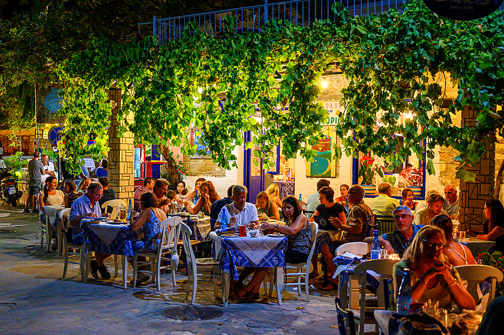 Evening view of traditional Greek restaurant, Parga, Preveza, Greece, Europe