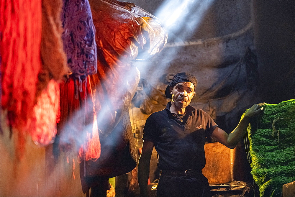 Man working in the dyer's souk, Marrakech, Morocco, North Africa, Africa