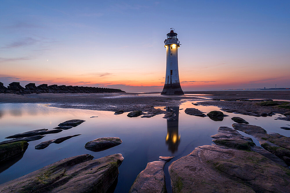 Perch Rock lighthouse with beautiful sunset, New Brighton, Cheshire, England, United Kingdom, Europe