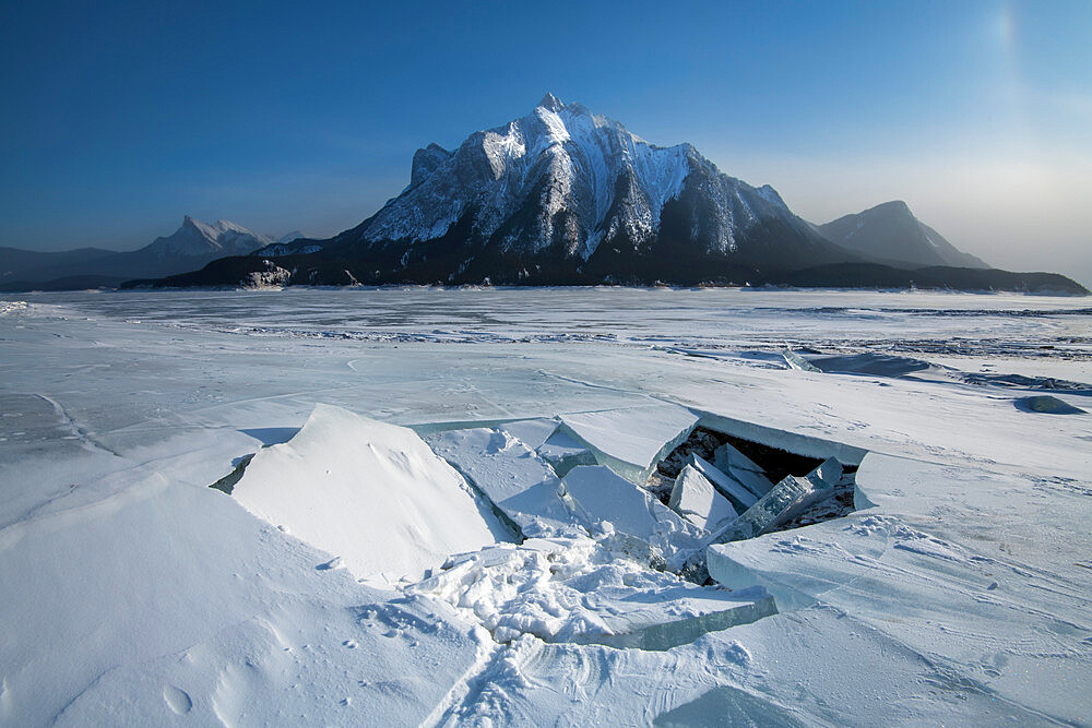 Ice fracture at Abraham Lake frozen with Mount Michener, Alberta, Canada, North America