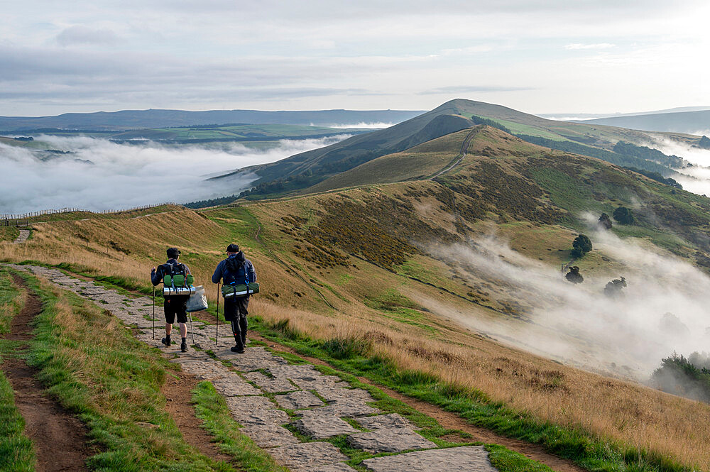 Walkers on The Great Ridge with cloud inversion, Edale, The Peak District, Derbyshire, England, United Kingdom, Europe