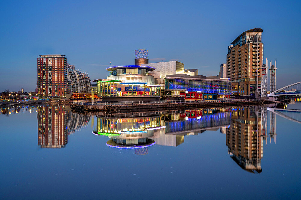 The Lowry Theatre at Salford Quays reflected in the River Irwell, Salford, Manchester, England, United Kingdom, Europe