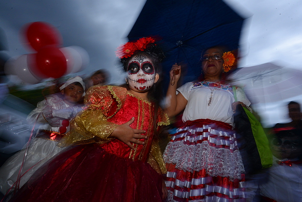 People participating in comparsas (street dances) during the Day of The Dead Celebration, Oaxaca City, Oaxaca, Mexico, North America