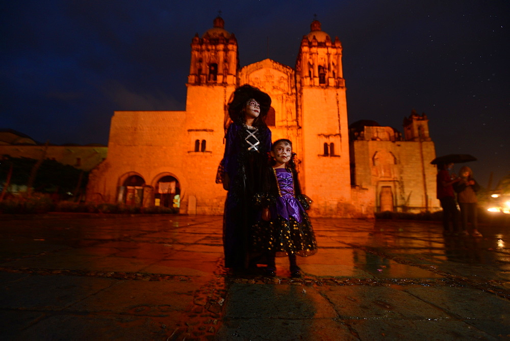 People participating in comparsas (street dances) during the Day of The Dead Celebration, Oaxaca City, Oaxaca, Mexico, North America