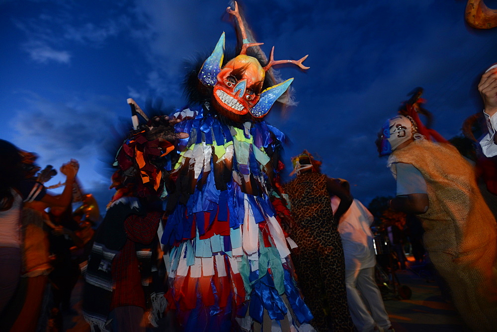 Comparsas (street dances) at the village of Yahuche where people disguise as mythical creatures, Oaxaca, Mexico, North America