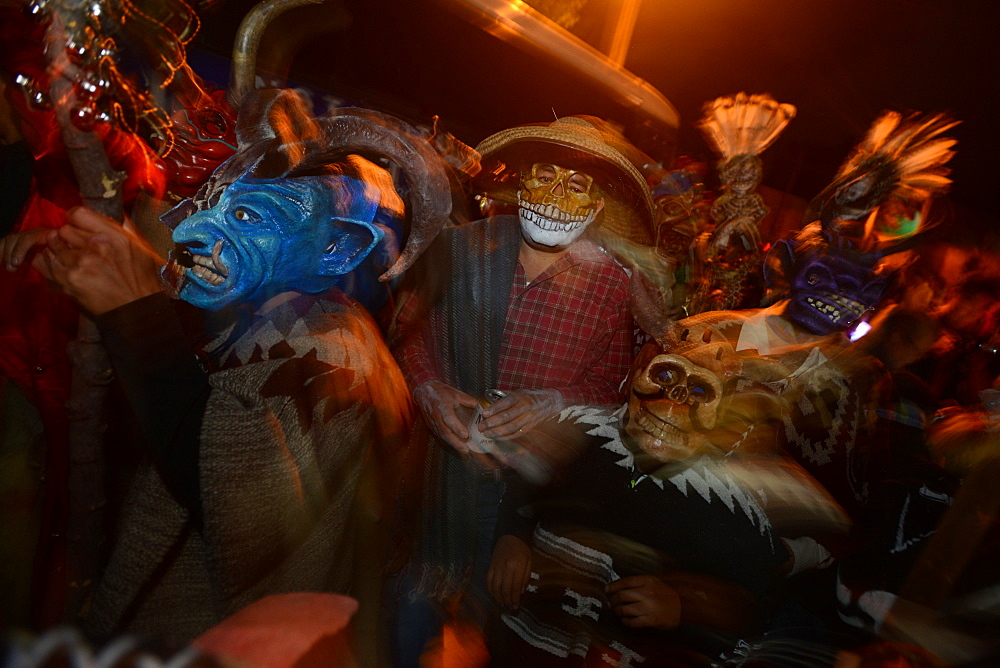 Comparsas (street dances) at the village of Yahuche where people disguise as mythical creatures, Oaxaca, Mexico, North America